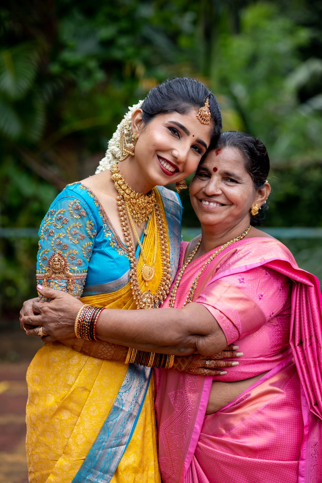 Emotional moment between bride and mother showcasing bridal transformation