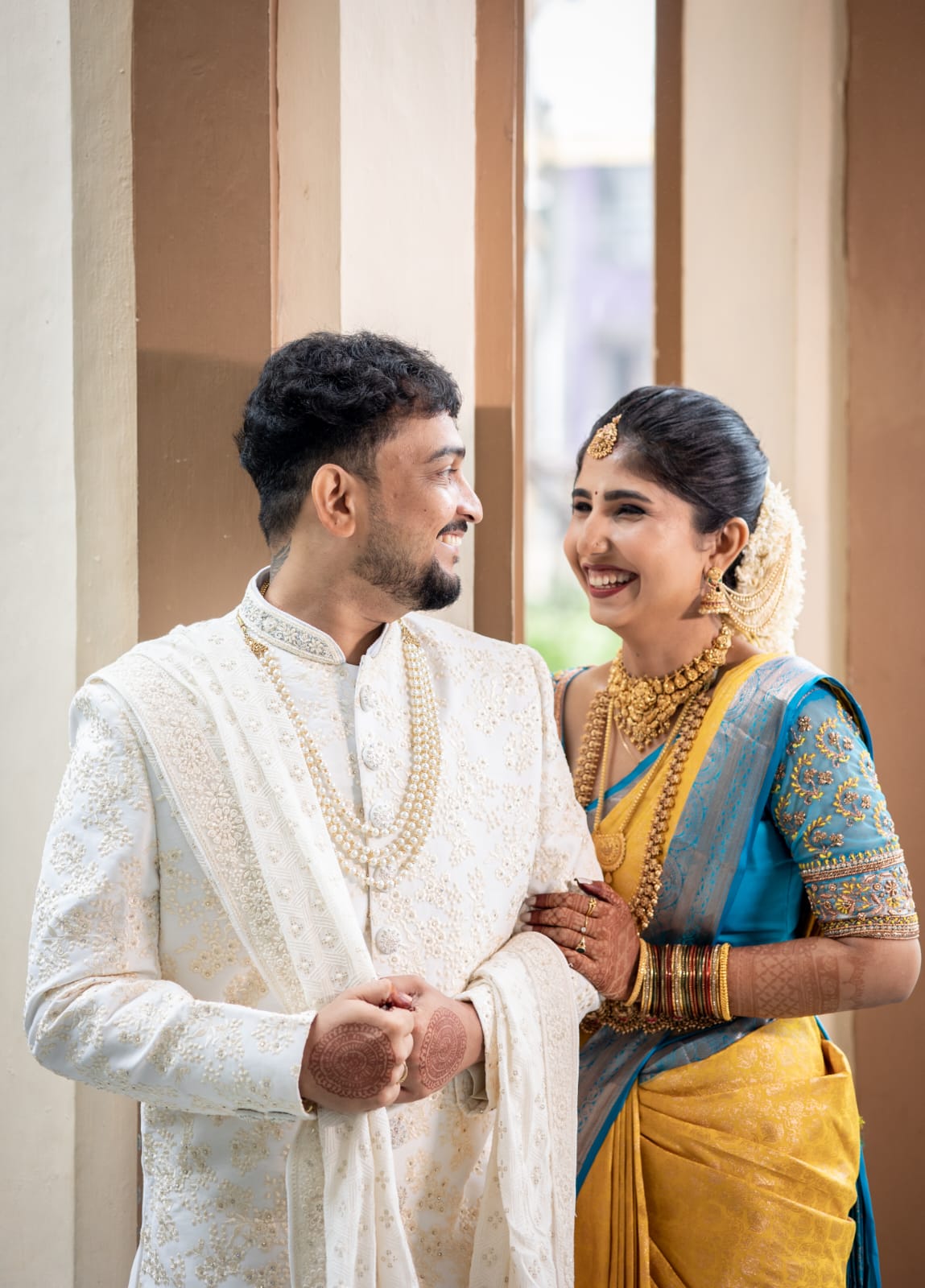 Traditional wedding couple in elegant attire with perfect styling